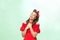 Beautiful young woman with pinup make-up and hairstyle. Studio shot on white background Royalty Free Stock Photo