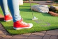 Beautiful young woman playing golf Royalty Free Stock Photo