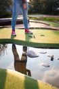 Beautiful young woman playing golf Royalty Free Stock Photo