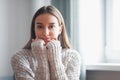 Beautiful young woman portrait behind window Royalty Free Stock Photo