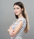 Beautiful young woman portrait cute tender pure smiling posing gray background Royalty Free Stock Photo