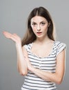 Beautiful young woman portrait cute tender pure smiling posing gray background Royalty Free Stock Photo