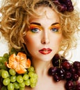 Beautiful young woman portrait excited smile with fantasy art hair makeup style, fashion girl with creative food fruit Royalty Free Stock Photo