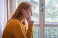 Beautiful young woman portrait praying at home