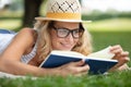 beautiful young woman portrait reading book