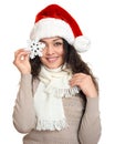 Beautiful young woman portrait in santa helper hat with big snowflake posing on white Royalty Free Stock Photo