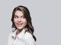 Beautiful young woman portrait. Smiling girl looking away isolated on white background Royalty Free Stock Photo