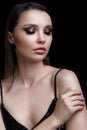 Beautiful young woman portrait with vogue shining face makeup