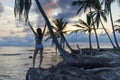 Beautiful young woman posing on the beach in a paradise island in Panama, at sunset. Royalty Free Stock Photo