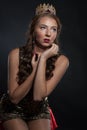 Beautiful young woman posing with a crown on her head Royalty Free Stock Photo