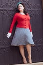 Beautiful young woman posing in vintage 1940s clothes Royalty Free Stock Photo