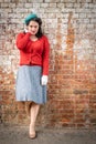 Beautiful young woman posing in vintage 1940s clothes Royalty Free Stock Photo