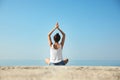 Beautiful young woman practicing yoga Royalty Free Stock Photo