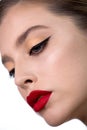 Beautiful young woman with professional make up and long eyelashes Portrait of beauty model with bright color red lip makeup and Royalty Free Stock Photo