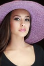 Beautiful Young Woman with Purple Hat Royalty Free Stock Photo