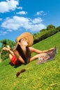 Beautiful young woman reading magazine in the park Royalty Free Stock Photo