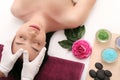 Beautiful young woman receiving facial massage in spa salon Royalty Free Stock Photo