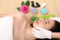 Beautiful young woman receiving facial massage in spa salon Royalty Free Stock Photo