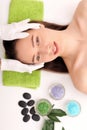 Beautiful young woman receiving facial massage in spa salon Royalty Free Stock Photo