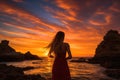 Beautiful young woman in red dress at sunset on the beach, Epic red sunset in Cala Llentrisca with a model, Ibiza, AI Generated
