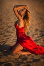 Beautiful young woman in red long dress Royalty Free Stock Photo