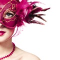 The beautiful young woman in a red mysterious venetian mask Royalty Free Stock Photo