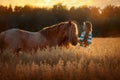 Beautiful young woman with red tinker horse in oats field