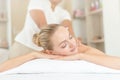 Beautiful young woman relaxing with hand massage at beauty spa. Body massage. Closed up of young beautiful woman getting spa Royalty Free Stock Photo
