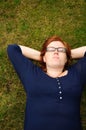 Beautiful young woman relaxing outside Royalty Free Stock Photo