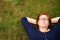 Beautiful young woman relaxing outside Royalty Free Stock Photo
