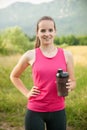 Beautiful young woman rests after a long run workout outdoor in nature Royalty Free Stock Photo