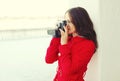 Beautiful young woman with retro vintage camera Royalty Free Stock Photo