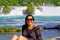 Beautiful young woman in rhine falls, Switzerland Royalty Free Stock Photo