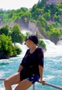 Beautiful young woman in rhine falls, Switzerland Royalty Free Stock Photo