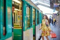 Beautiful young woman running to catch a train Royalty Free Stock Photo