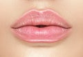 Beautiful young woman`s lips closeup, Part of the model girl face, youth concept. Perfect healthy skin. Natural make-up Royalty Free Stock Photo