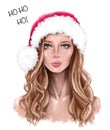 Beautiful young woman in Santa hat. Fashion girl in red cap with fur. Pretty woman face. Royalty Free Stock Photo