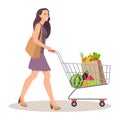 Beautiful young woman with shopping cart full of packages with vegetables and fruits. Happy smiling woman with products. Vector Royalty Free Stock Photo