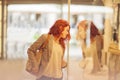 Beautiful young woman shopping in the city, mall with shopping bag Royalty Free Stock Photo