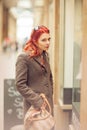 Beautiful young woman shopping in the city, mall with shopping bag Royalty Free Stock Photo