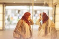 Beautiful young woman shopping in the city, mall with shopping bag Royalty Free Stock Photo