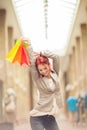 Beautiful young woman shopping in the city, mall with shopping bag Royalty Free Stock Photo