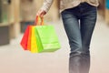 Beautiful young woman shopping in the city, mall with shopping bag Royalty Free Stock Photo