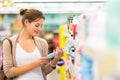 Beautiful young woman shopping in a grocery store/supermarket Royalty Free Stock Photo