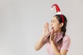 Beautiful young woman shouting, isolated over a white background Royalty Free Stock Photo