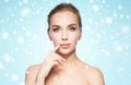 Beautiful young woman showing her lips over snow Royalty Free Stock Photo