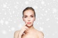 Beautiful young woman showing her lips over snow Royalty Free Stock Photo