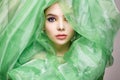 Beautiful young woman in silk veil