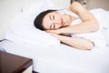 Beautiful young woman sleep on the bed at home Royalty Free Stock Photo