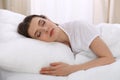 Beautiful young woman sleeping while lying in her bed. Concept of pleasant and rest reinstatement for active life Royalty Free Stock Photo